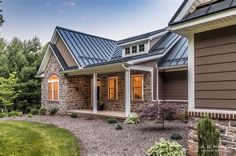 black metal roof on brick house|houses with metal roofs pictures.